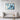 Whirling Azure Blossoms in Motion Framed Canvas (Black) / 48 x 32