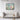 Enchanted Waters Hummingbird Haven Framed Canvas (Black) / 40 x 30
