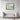 Enchanted Flight over Floral Waters Framed Canvas (Black) / 40 x 30