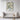 Serene Blossoms in Geometric Vase Framed Canvas (Black) / 24 x 32